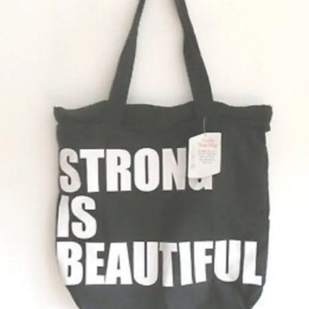Layer 8 Studio Tote bag Black Strong is Beautifull